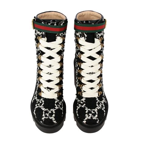 Bottes et bottines de pluie Gucci pour femme .